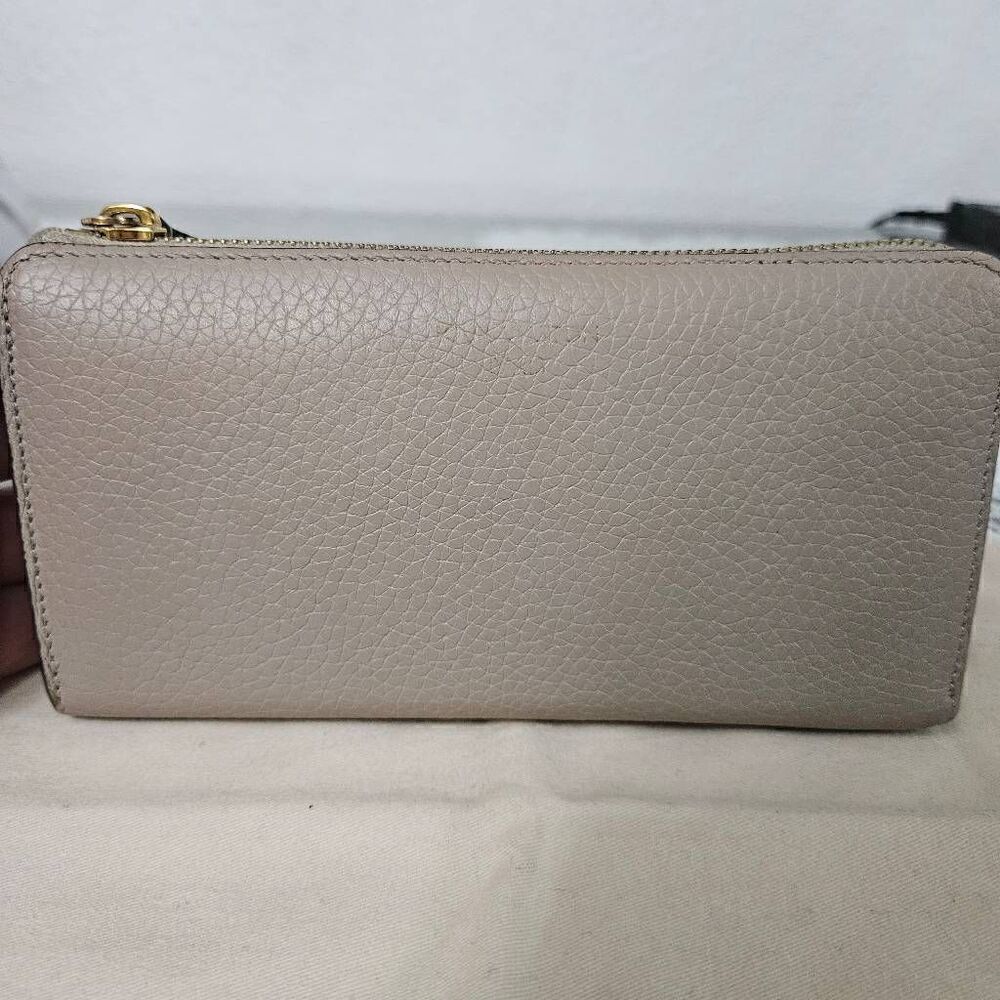 Louis Vuitton Taurillon portefeuille Comete long zip wallet